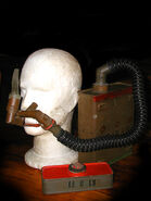 Remains of Boris Plotinkoff's Petit Model Tissot. It is missing the faceblank, original hose, and original flutter valve entirely, but otherwise is a very good example of a wartime Tissot mask. It is currently unknown where this specimen resides (possibly Viktor Ferrando's collection)