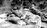 Slovakian soldiers, the carrier of the mask is clearly visible on the hip of the first man.