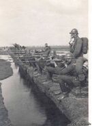 Military training with masks, note that the soldiers are using Gāzmaska A and SBR as well.