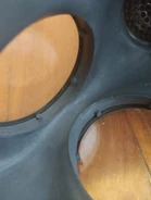 The anti-fogging lenses are kept onto the eyepieces with several rubber studs, much like the P.C. 40
