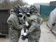 Slovenian troops using the suit with M95 gas mask and without breathing aid apparatus.