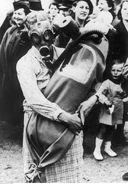 Mother using an Ajax F2 connected to a baby gas mask