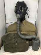 October of 1944 dated Neoprene M3-10A1-6 Army Lightweight Service Mask with an OD3/OD7 hybrid colored M6 carrier. From the collection of ChemicalCucumber23.