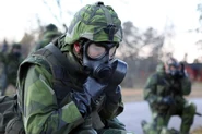 Swedish soldier on NBC exercise waring 'C combat suit 90'.