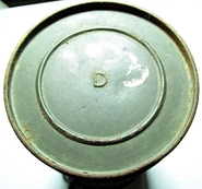 Waterproof canister with the "D" marking.