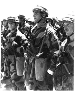 Italian paratroopers being inspected. Note the T.35 bag on their side