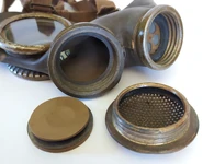 Disassembled exhale valve assembly, seen from the outside. Note the metal disc on the exhale valve (this sample is an L.T.35-AB)