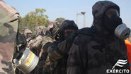 Portuguese troops on training, the chemical suits are French.