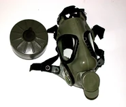 Right-Handed M9A1 Gas Mask With Discolored Rubber.jpg (305 KB) An M9 Facepiece showing signs of severe discoloration. Notice the right canister stem for left-handed riflemen.
