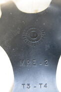 Markings on the harness. The round one shows that the mask was made in 2003.