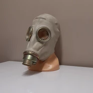 Fifth version (1969 - 1990): the rim around of the outer exhale valve is cut just next to threaded connection