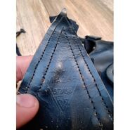 Triangular leather patch