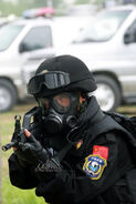 A member of the Snow Leopard Commando Unit of the Chinese People's Armed Police Force demonstrating his capablities.