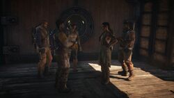 The Outsiders regroup outside the town hall.