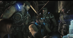 Baird, Marcus, Cole, Anya and Hoffman around the hologram