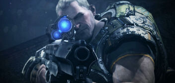 Garron apunta y se toma un segundo para decidir a quién disparar; al Dron o a Loomis.