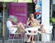 Bella-thorne-FroYo-Smurfs-in-background