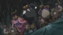The tanuki chase after the Kitarō Family.