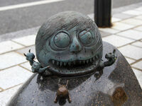 Statue of Ōkamuro in Shigeru Mizuki Road