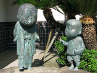 "NonNonBa and Me" statue of young Mizuki and NonNonBa