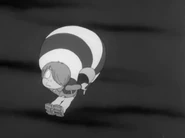 Parachuting Kitaro S1EP16.png (226 KB) Chanchanko used as a parachute (1968 anime)
