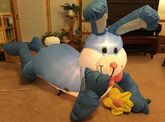 Blue Bunny laying holding flower (Prototype)