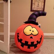 Gemmy inflatable goofy pumpkin with witch hat