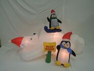 Gemmy inflatable polar bear and penguin sled rides attacrtion