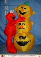 Gemmy inflatable elmo with pumpkin stack