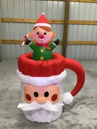 Elf in Santa cup