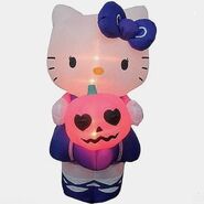 Hello Kitty Holding Jack O ' Lantern