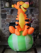 Tigger sitting on Easter egg