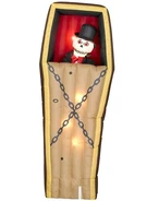Animated Skeleton Rising from Coffin.