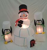 Snowman and penguin and igloo scene