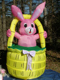 Pink Easter bunny in basket