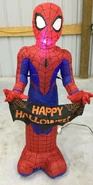 Spiderman holding Halloween Banner