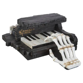 Skeleton hand playing piano