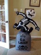 Skeleton jumping over Tombstone