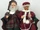 Singing Claus Couple on Couch