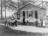 Group portrait of students rural schoolhouse in Greene County, Ohio, ca. 1900-1910.