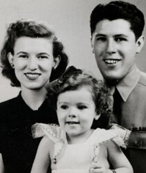 Baby Ann Dunham with parents Madelyn and Stanley c1945 