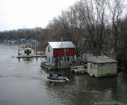 People live year-round in this community of boathouses on the Mississippi River in 