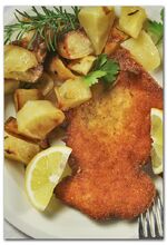 Cotoletta e patate al forno