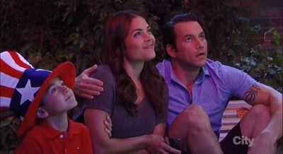 Spencer watches fireworks with his dad and Britt