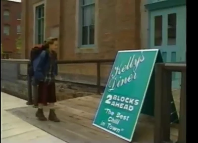 A young Lucky Spencer admires a sign for Kelly's (1993)