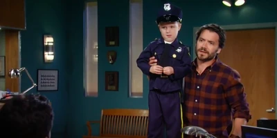 Rocco dressed as cop for Halloween (with his dad)