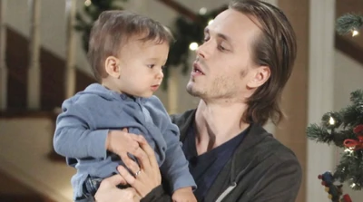 Baby Aiden with his father