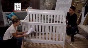 Nathan and Maxie talk while they put Georgie's crib together