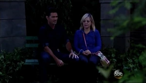 Maxie and Nathan sit in the park on the their way home