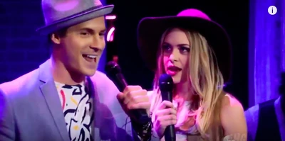 Kiki looks at Dillon during their performance